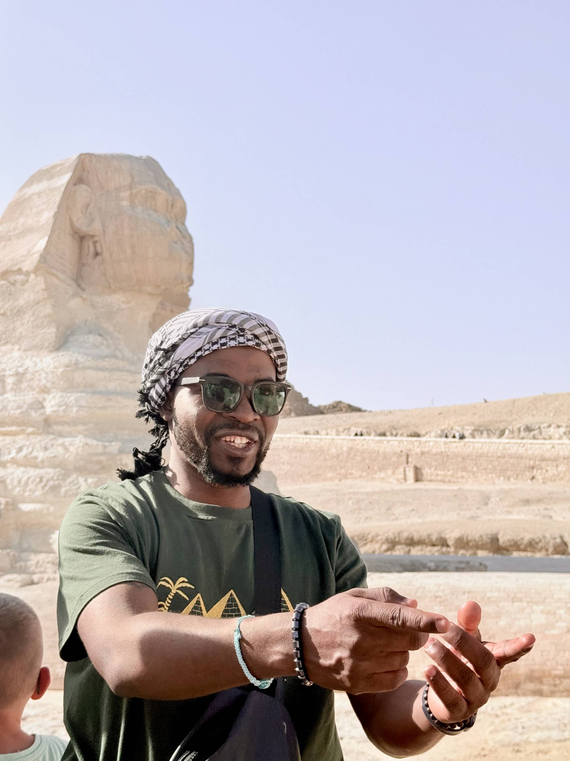 Mugisha David in an international travel setting